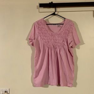 Woman’s pink top